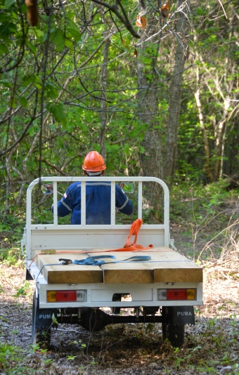 SUB: Motorbike with trailer to get the timber out the forest